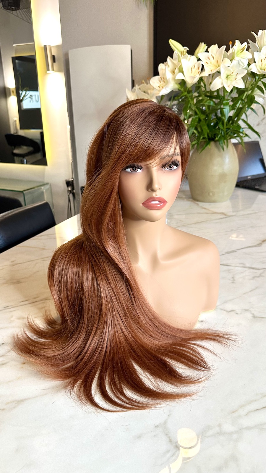 Perruque en cheveux naturels avec coloration cuivrée